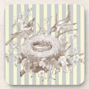 Posavasos La Petite Famille sobre fondo azul y crema