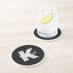Posavasos Letra K de purpurina plateada negra
