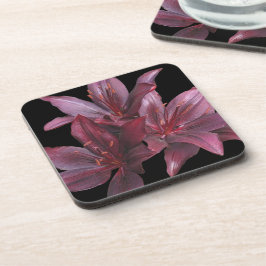 Posavasos Mieles asiáticos rojos oscuros sobre flor negra