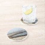 Posavasos Morro Bay California Ocean Photography<br><div class="desc">A foggy overcast day in Morro Bay California with the ocean waves hitting the rocks on the shore in this beach photograph souvenir. This seaside travel photo keepsake coaster gift features black cursive script above the beach rocks and grey sky.</div>