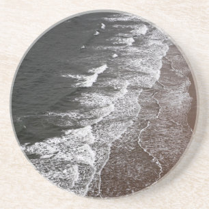 Posavasos Olas rotas en una playa de arena