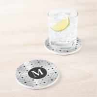 Patrón geométrico negro fondo metálico plateado