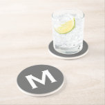 Posavasos Piedra de monograma clásico gris mínimo<br><div class="desc">El diseño inicial de un monograma mínimo presenta un fondo gris sencillo con su tipografía inicial en bloques clásicos en blanco para un aspecto limpio y sencillo.</div>