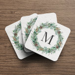 Posavasos Rustic Winter Greenery Monogram Initial Wreath<br><div class="desc">Elegant hard plastic holiday beverage coaster design features a rustic chic white wood grain background with a wreath of winter watercolor greenery framing a family / last name monogram initial.</div>