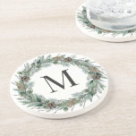 Posavasos Rustic Winter Greenery Monogram Initial Wreath<br><div class="desc">Elegant holiday sandstone stone beverage coaster design features a rustic chic wreath of winter watercolor greenery framing a family / last name monogram initial. Includes a white background color.</div>