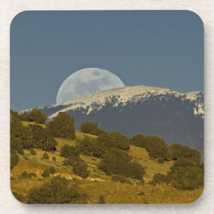 Posavasos Salida de la luna sobre las montañas Sangre de Cri