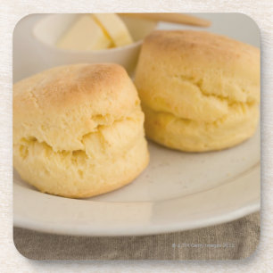 Posavasos Scone llano con mantequilla en la placa