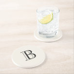 Posavasos Simple Crema y Monograma Negro Crema<br><div class="desc">Crema y negro Monograma  Cojín de piedra de fondo de crema. Regalo de monograma.</div>
