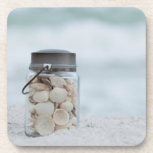 Posavasos Tarro de Seashells en la playa el la Florida