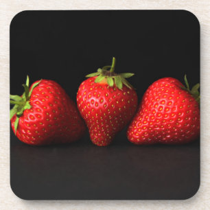 Posavasos Tres fresas sobre el coastercán negro