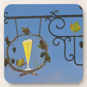 Posavasos Un cartel de hierro forjado que ilustra el tema