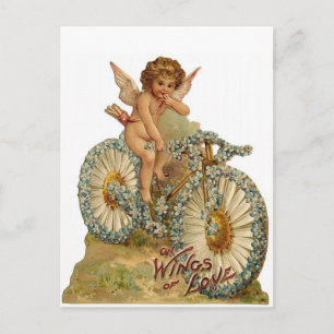 Postal Alas del amor Cupido en una bicicleta