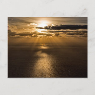 Postal Amanecer por encima del océano Atlántico