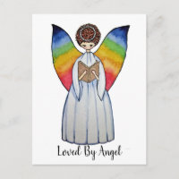 Ángel de color de agua con alas arco iris leyendo
