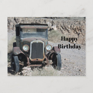 Postal Aniversario de la foto de un auto desmontado en un