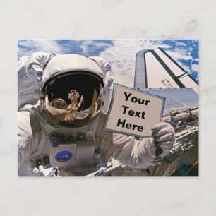 Postal Astronauta de la NASA sosteniendo un letrero - Agr