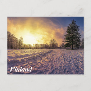 Postal Atardecer sobre el nevado parque invernal