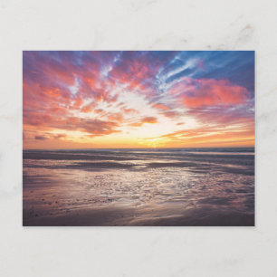 Postal Atardecer sobre la playa y el mar