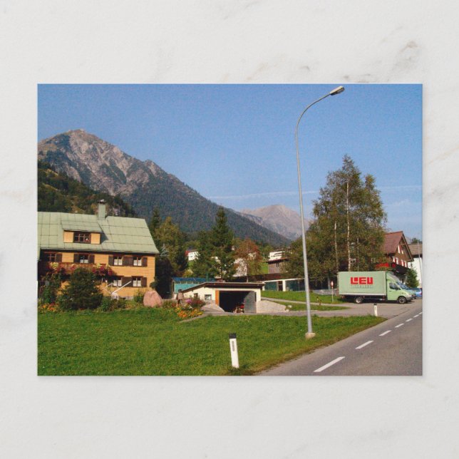 Postal Austria, entrada de la aldea ocupada (Anverso)
