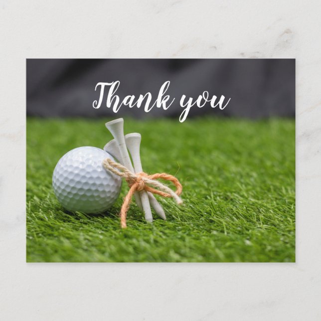 Postal Balón de golf y tee sobre césped verde gracias (Anverso)