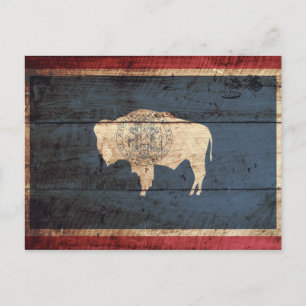 Postal Bandera estatal Wyoming en grano de madera vieja