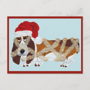 Postal Basset Hound enredado en espumillón