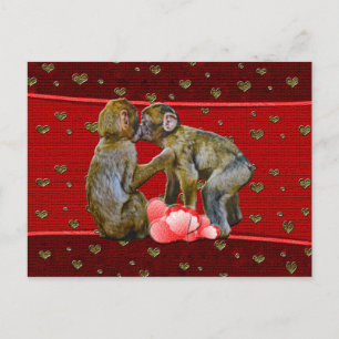 Postal Besando los corazones flotantes de los chimpancés