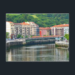 Postal Bilbao. Paisaje urbano con río.<br><div class="desc">Bilbao. Paisaje urbano con río. Taza de viaje. España. Provincia de Vizcaya. País Vasco. Casas. Muelle del río. Árboles. Foto.</div>