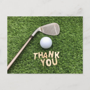 Postal Bola de golf con la palabra gracias en hierba verd