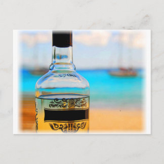 Postal Botella de ron en la playa