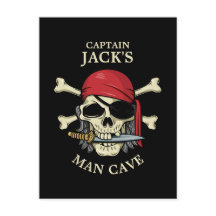 Calavera pirata y caverna masculina de los huesos 