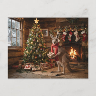 Postal Canguro festivo sosteniendo un regalo de Navidad