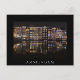 Postal Casas de Ámsterdam con luces de colores durante la