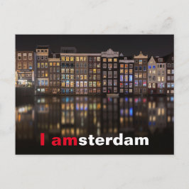 Postal Casas de Ámsterdam con luces de colores durante la