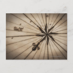 Postal Cierre del rosa de viento en el mapa antiguo