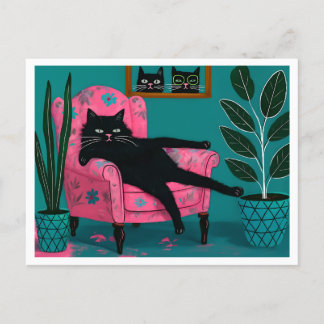Postal Colgado de gato negro de Guay en sillón rosa