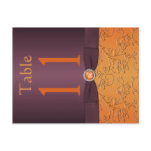 Postal con número de tabla morado y mandarino