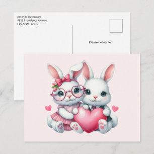Postal Conejitos lindos compartiendo un corazón
