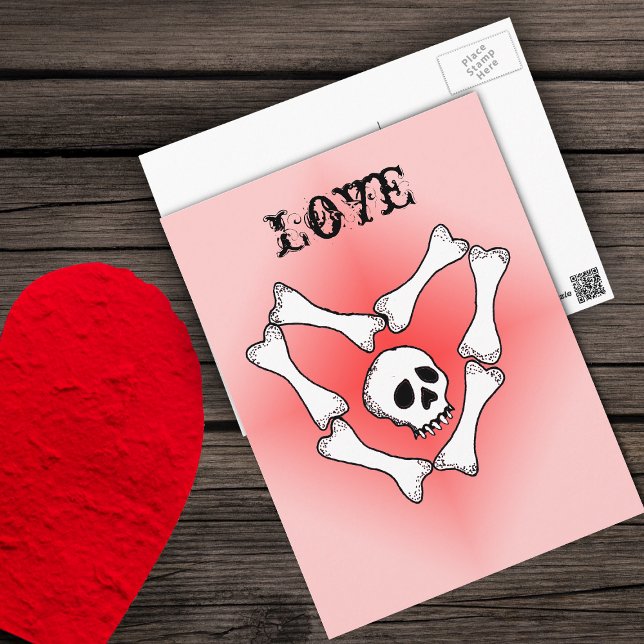 Postal Corazón de los huesos Amor Skull PostCard (White skull in white bones in heart shape on red fading to pink Love Valentine postcard.)