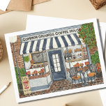 Postal Cute café House Storefront Watercolor<br><div class="desc">Envíe a alguien una nota especial con esta postal de temporada de Coffee Shop que incluye una pintura acuarela original de una pintoresca cafetería y cafetería. El Common Grounds Coffee House está preparado para servir postres de calabaza por primera vez en la temporada junto con pasteles recién hechos. Un lugar...</div>