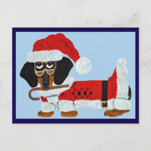 Postal Dachshund negro y marrón de Santa con un bastón de