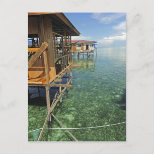 Postal Dayak Lau viviendo en barcos y casas sobre pilotes