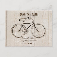 Bicicleta antigua sobre poste de madera rústico Ta
