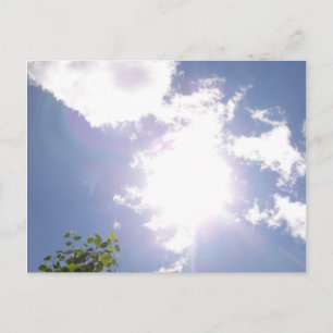 Postal de haz solar y nubes