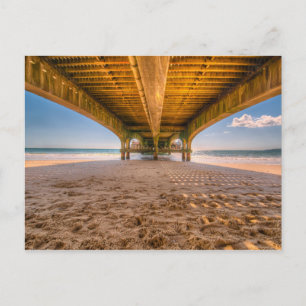 Postal Debajo de un muelle, playa con huellas, océano, ci