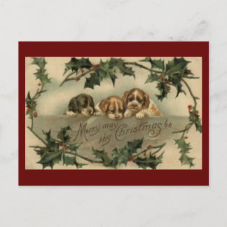 Postal del navidad del trío del perrito del