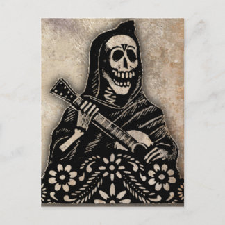 Postal Día de la Guitarra Muerta tocando esqueleto