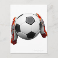 Dos guantes porteros sujetando un futbol