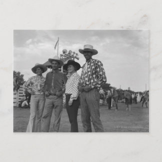 Postal Dos hombres y dos mujeres en un rodeo