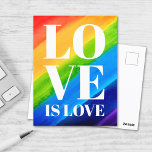 Postal El amor es amor orgullo arcoiris<br><div class="desc">Esta postal del Orgullo Gay está decorada con LOVE IS LOVE en letras blancas en negrita sobre un fondo de arcoiris color agua de rojo,  naranja,  amarillo,  verde,  azul y morado. Acuarela original © Michele Davies.</div>